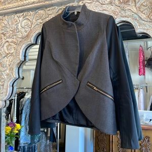 Gray and black snap front jacket zipper pockets